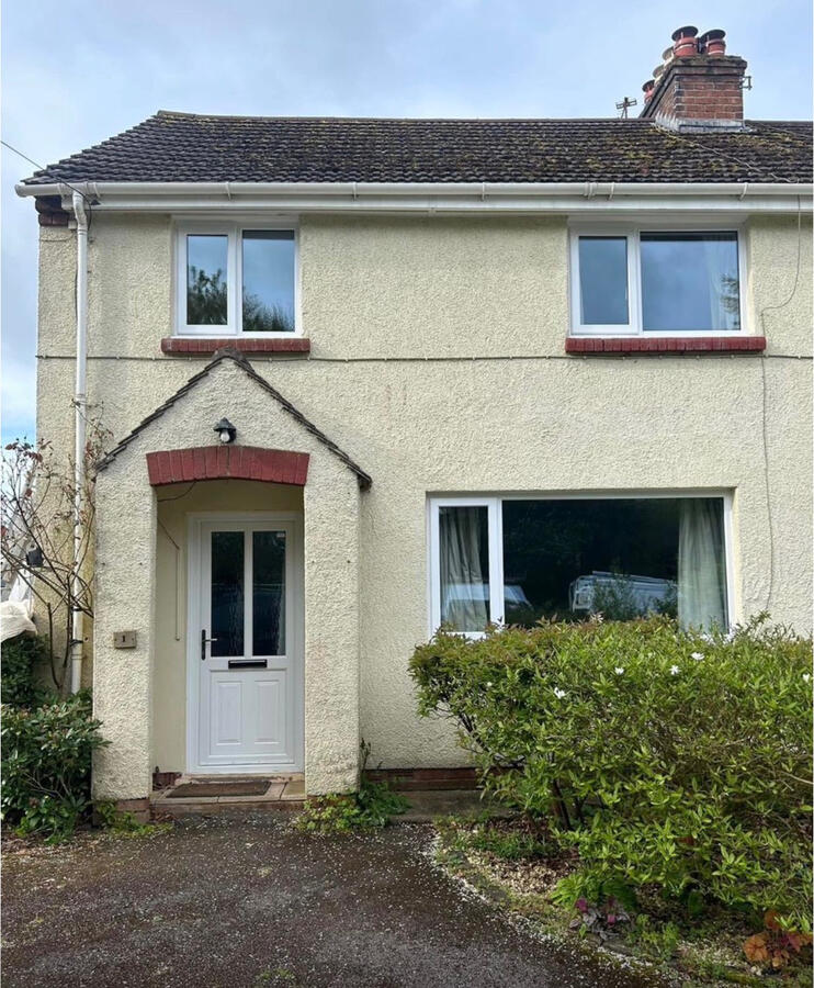 before picture showing a house before being painted