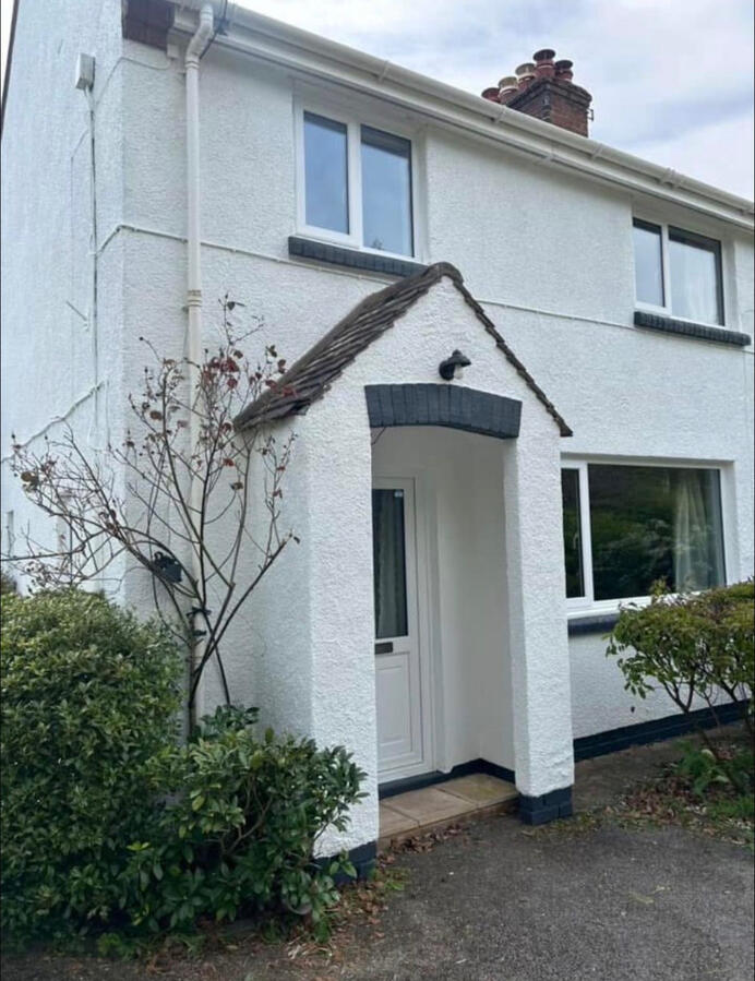 completed house painting displays a house finished after painting the exterior